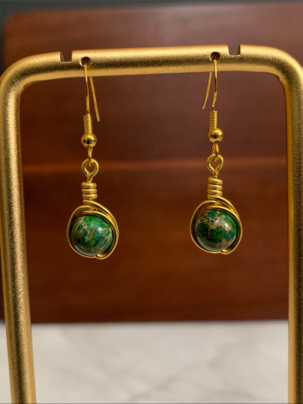 Handmade wire wrapped green sea sediment jasper bead earrings